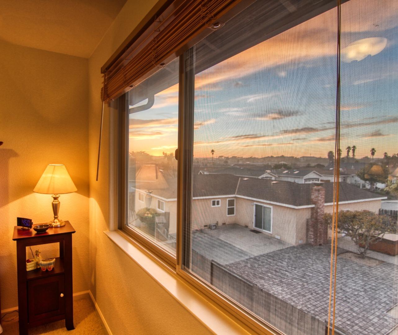 146 Katerina Lane Marina, CA 93933 - Photo 14 of 23 a view of a porch with furniture and floor to ceiling windows