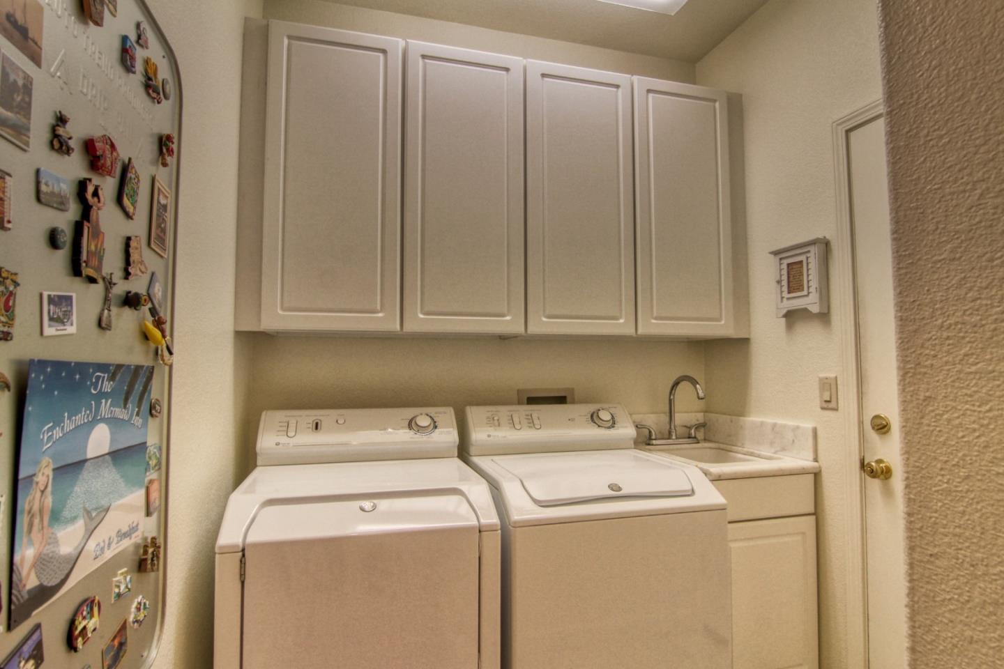 146 Katerina Lane Marina, CA 93933 - Photo 22 of 23 a utility room with dryer and washer