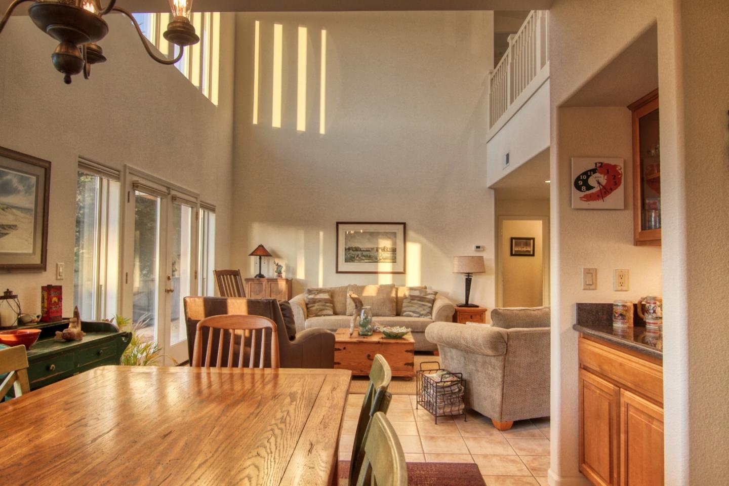 146 Katerina Lane Marina, CA 93933 - Photo 3 of 23 a living room with furniture dining area and a large window