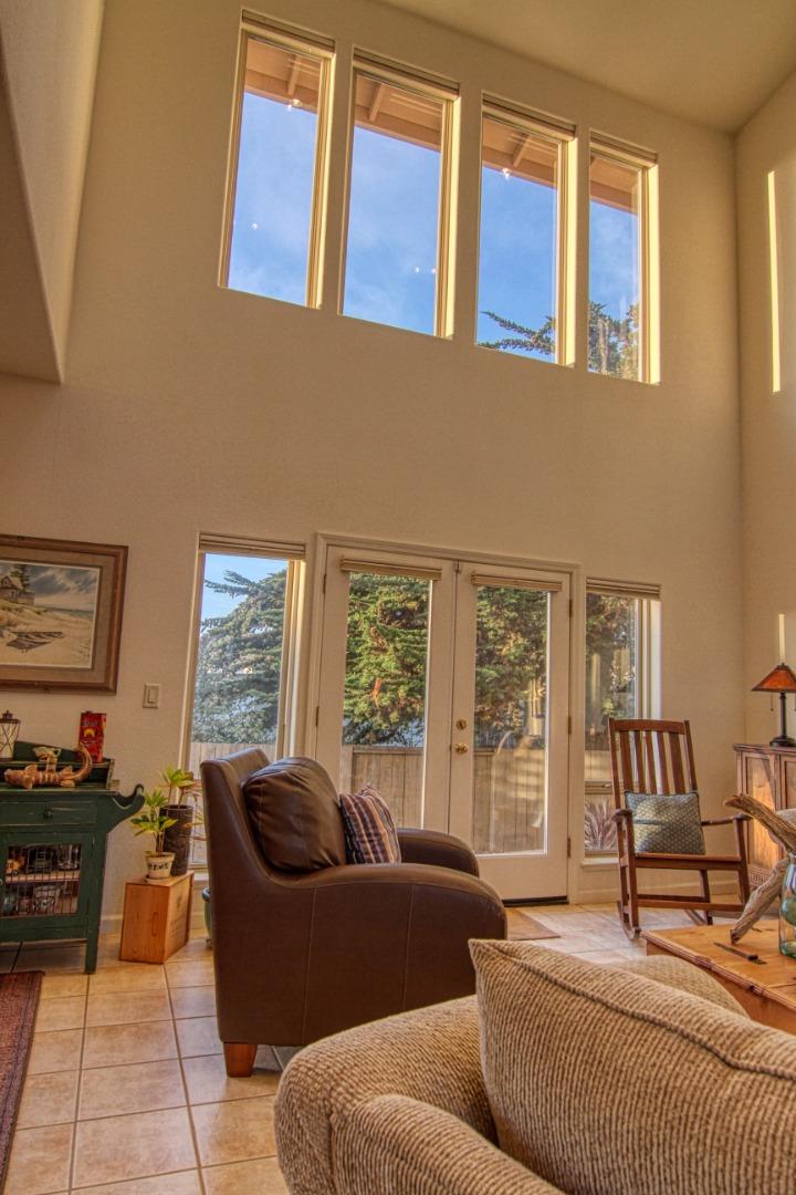 146 Katerina Lane Marina, CA 93933 - Photo 4 of 23 a living room with furniture and large windows