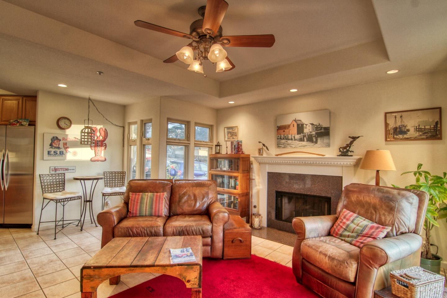 146 Katerina Lane Marina, CA 93933 - Photo 8 of 23 a living room with furniture and a fireplace