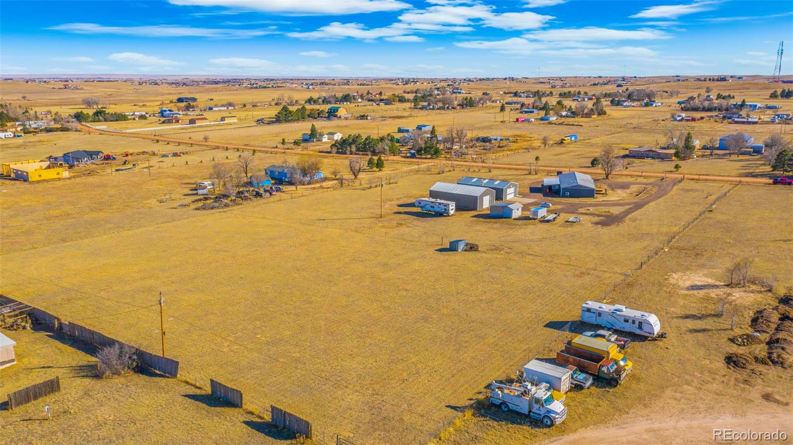 12340 Smith Road Peyton, CO 80831 - Photo 45 of 49 a view of a city and an ocean view