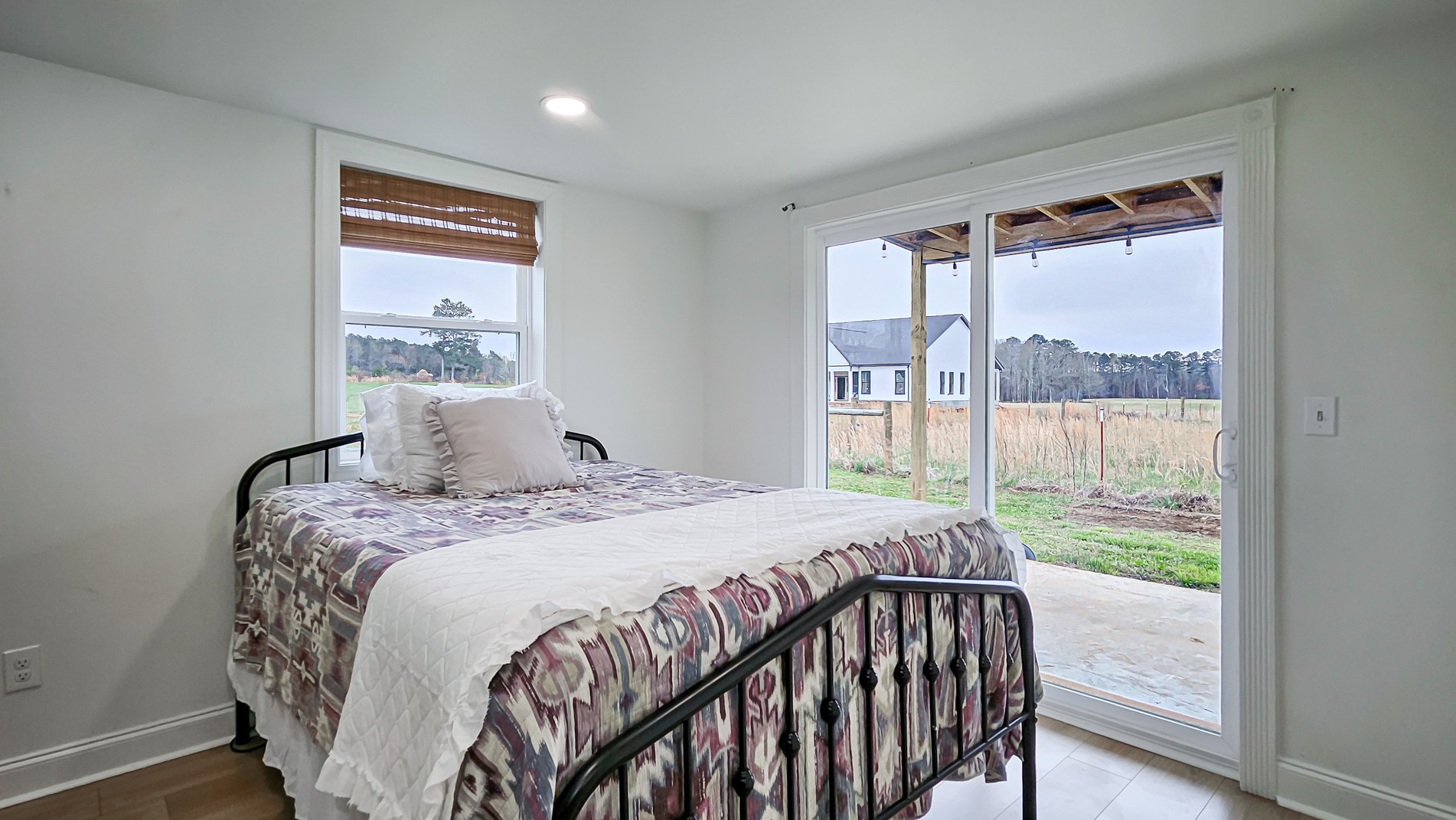 25872 Union Hill Road Ardmore, TN 38449 - Photo 14 of 28 a bedroom with a bed and a large window