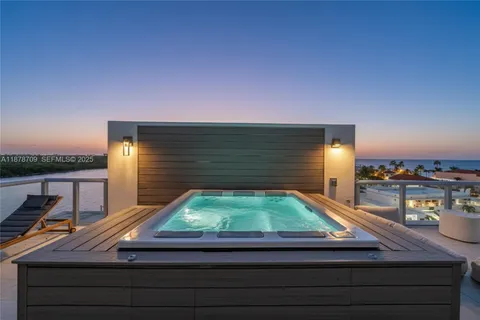 a room view with a flat screen tv