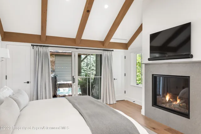 a bathroom with a sink mirror and vanity