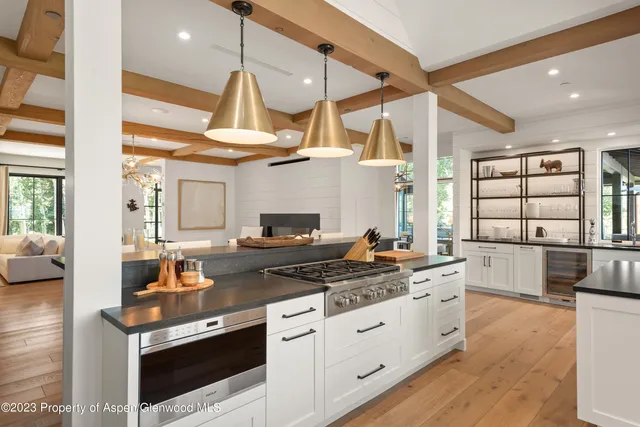 a front view of a house with a garden and porch