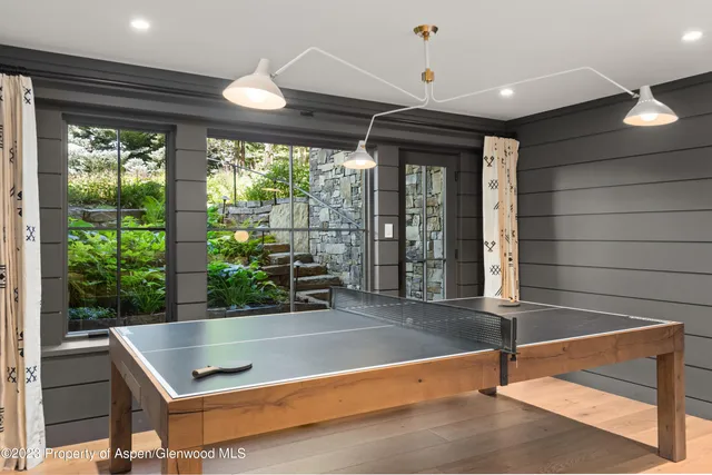 a view of a house with a yard porch and sitting area