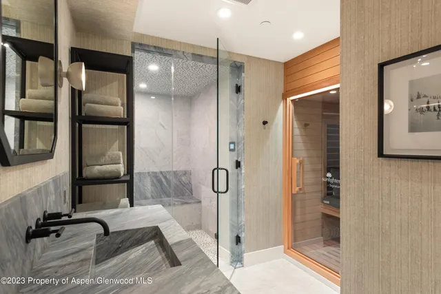 a front view of a house with a yard table and chairs