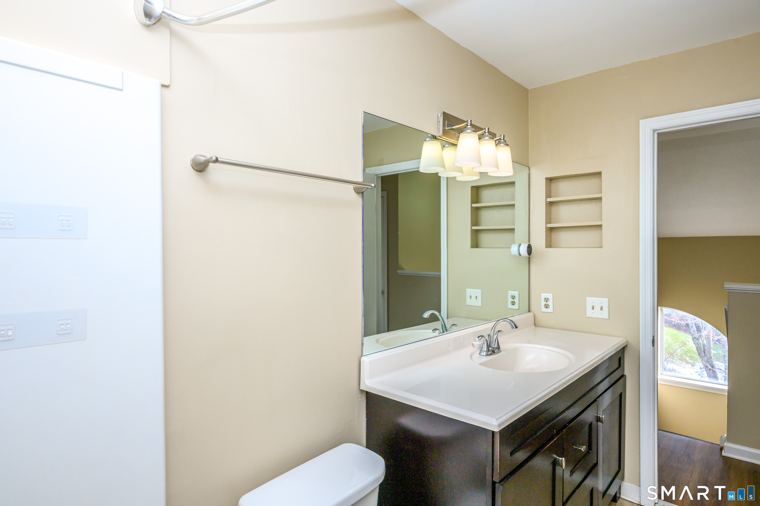 925 Oronoke Road, Unit 21A Waterbury, CT 06708 - Photo 14 of 39 a bathroom with a sink and a mirror