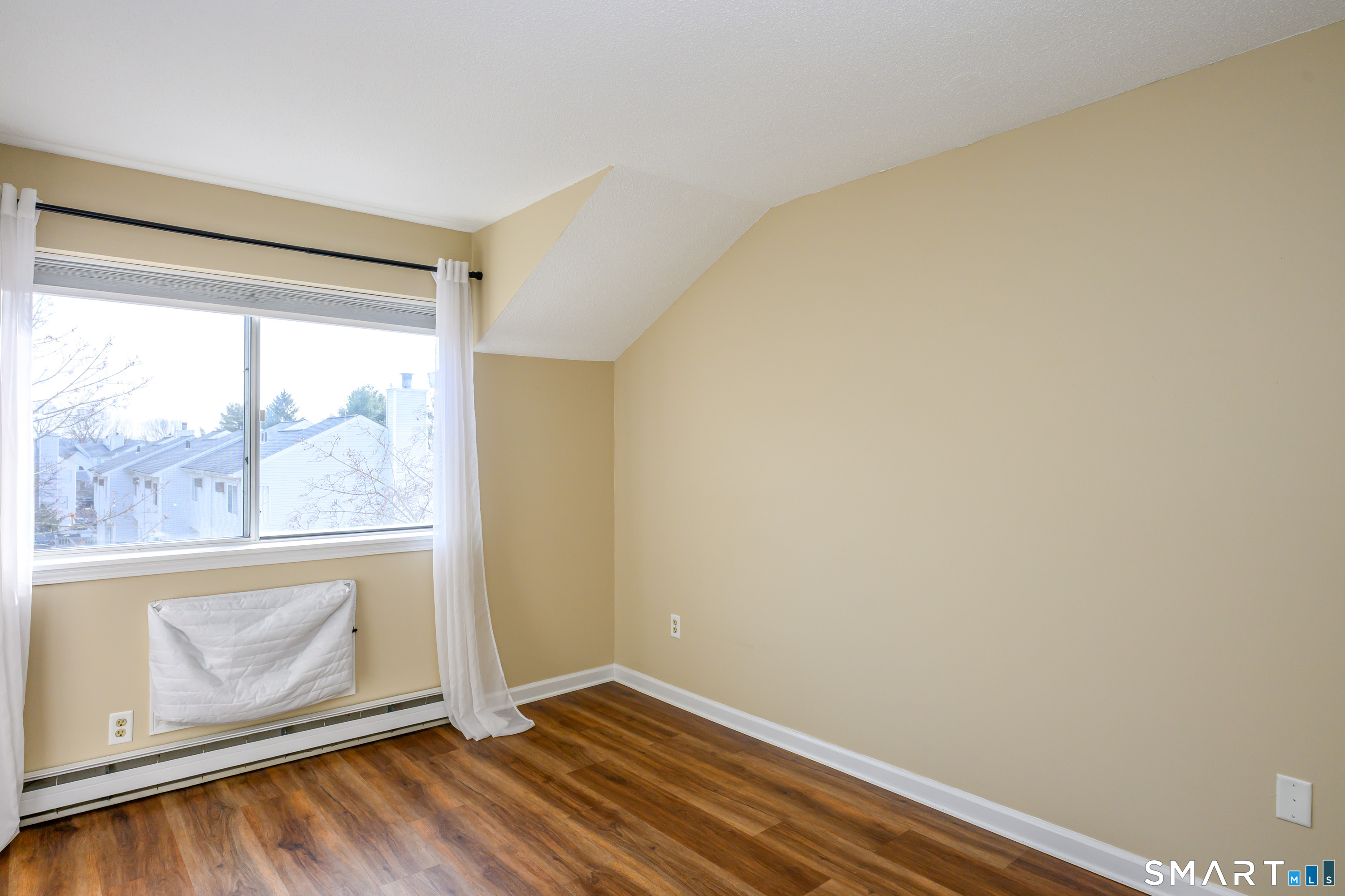925 Oronoke Road, Unit 21A Waterbury, CT 06708 - Photo 18 of 39 a view of wooden floor and brick walls