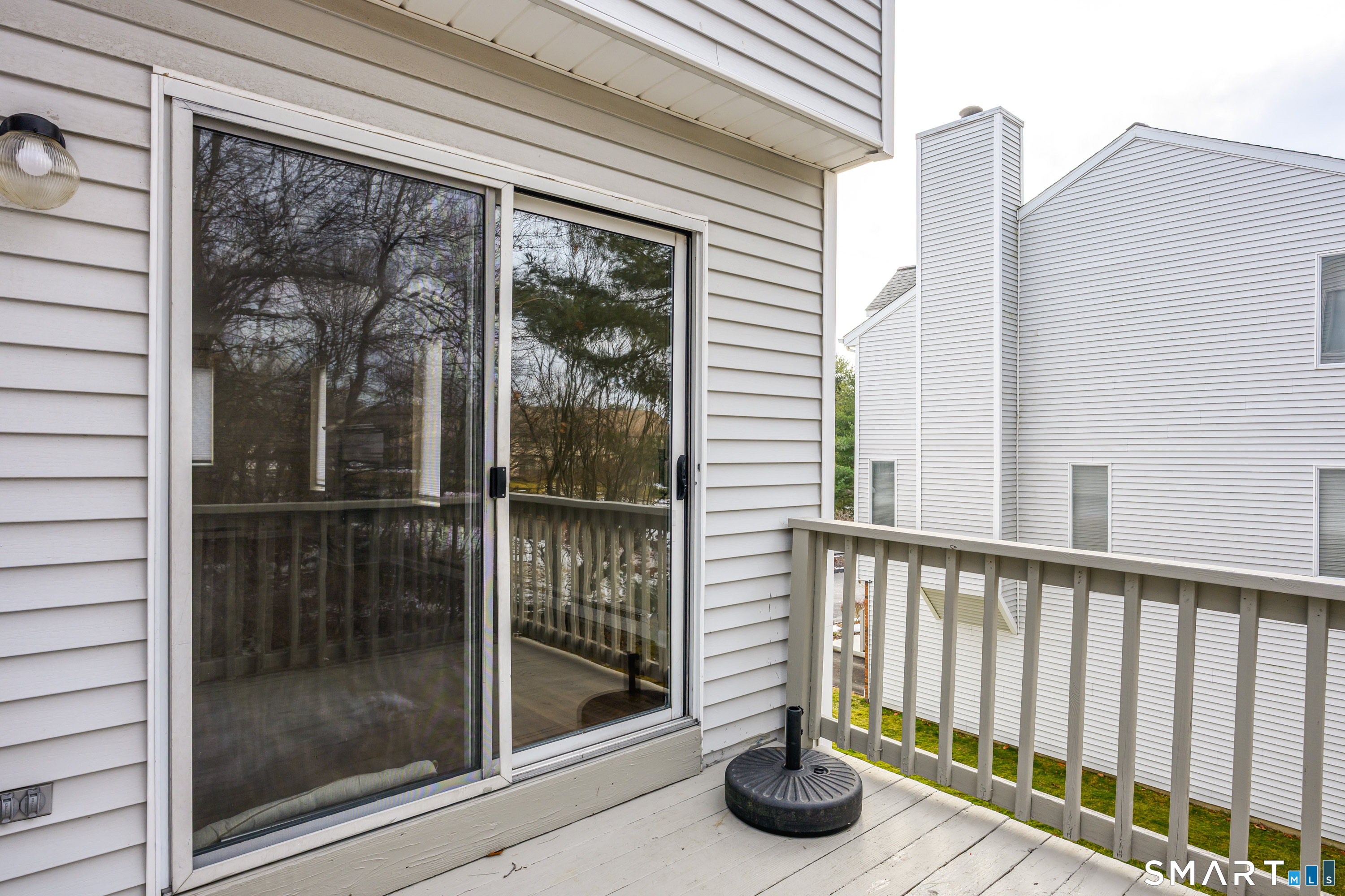 925 Oronoke Road, Unit 21A Waterbury, CT 06708 - Photo 33 of 39 a view of a balcony with floor to ceiling window