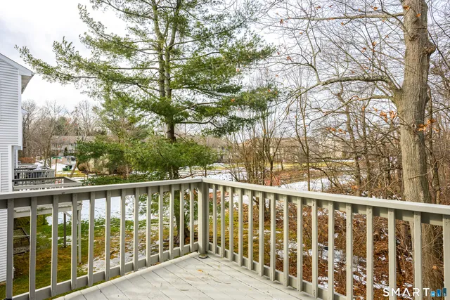 a view of a wooden street from a balcony