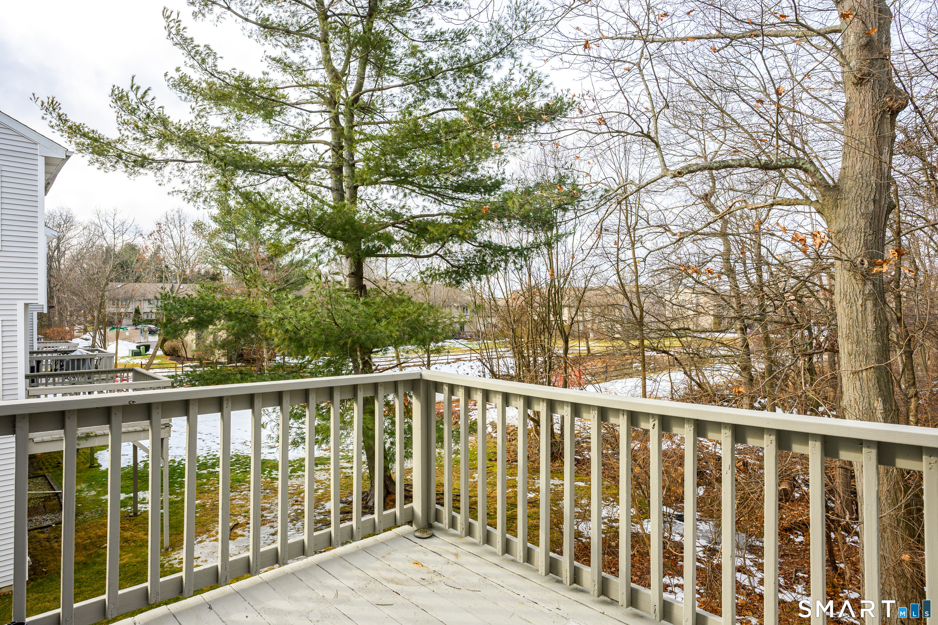 925 Oronoke Road, Unit 21A Waterbury, CT 06708 - Photo 34 of 39 a view of a wooden street from a balcony