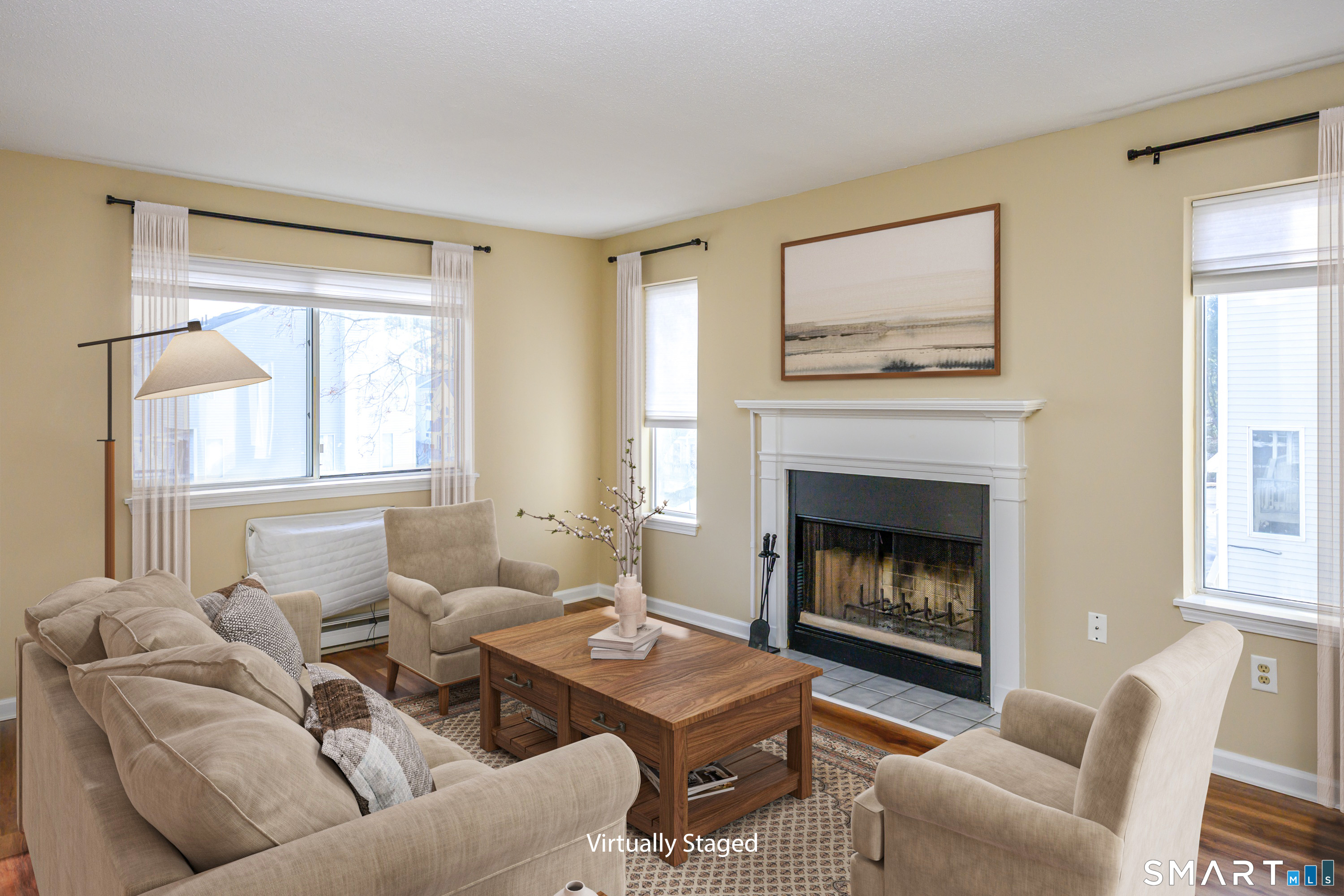925 Oronoke Road, Unit 21A Waterbury, CT 06708 - Photo 10 of 39 a living room with furniture a window and a fireplace