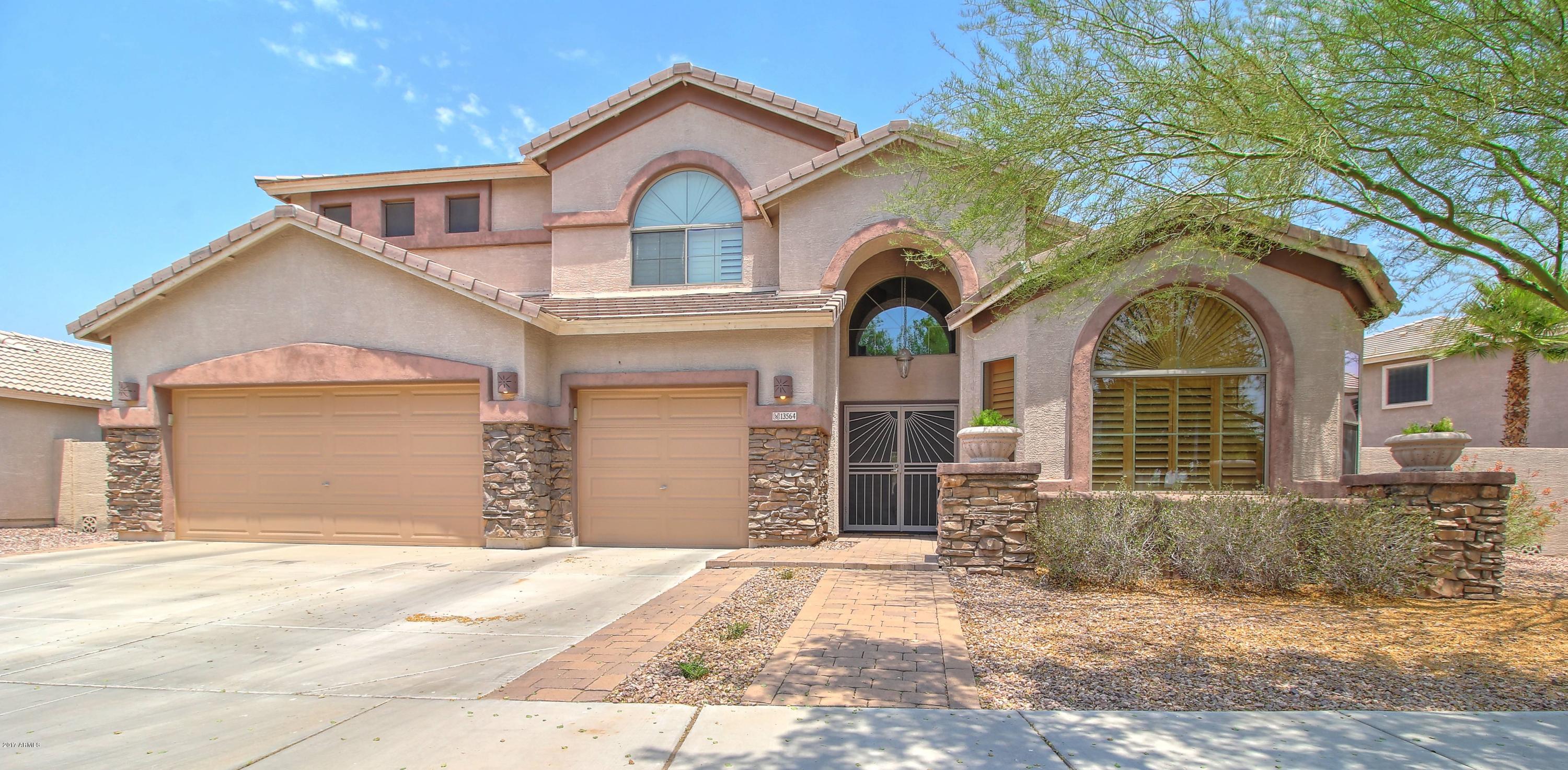 13564 West Boca Raton Road Surprise, AZ 85379 - Photo 1 of 36 Front