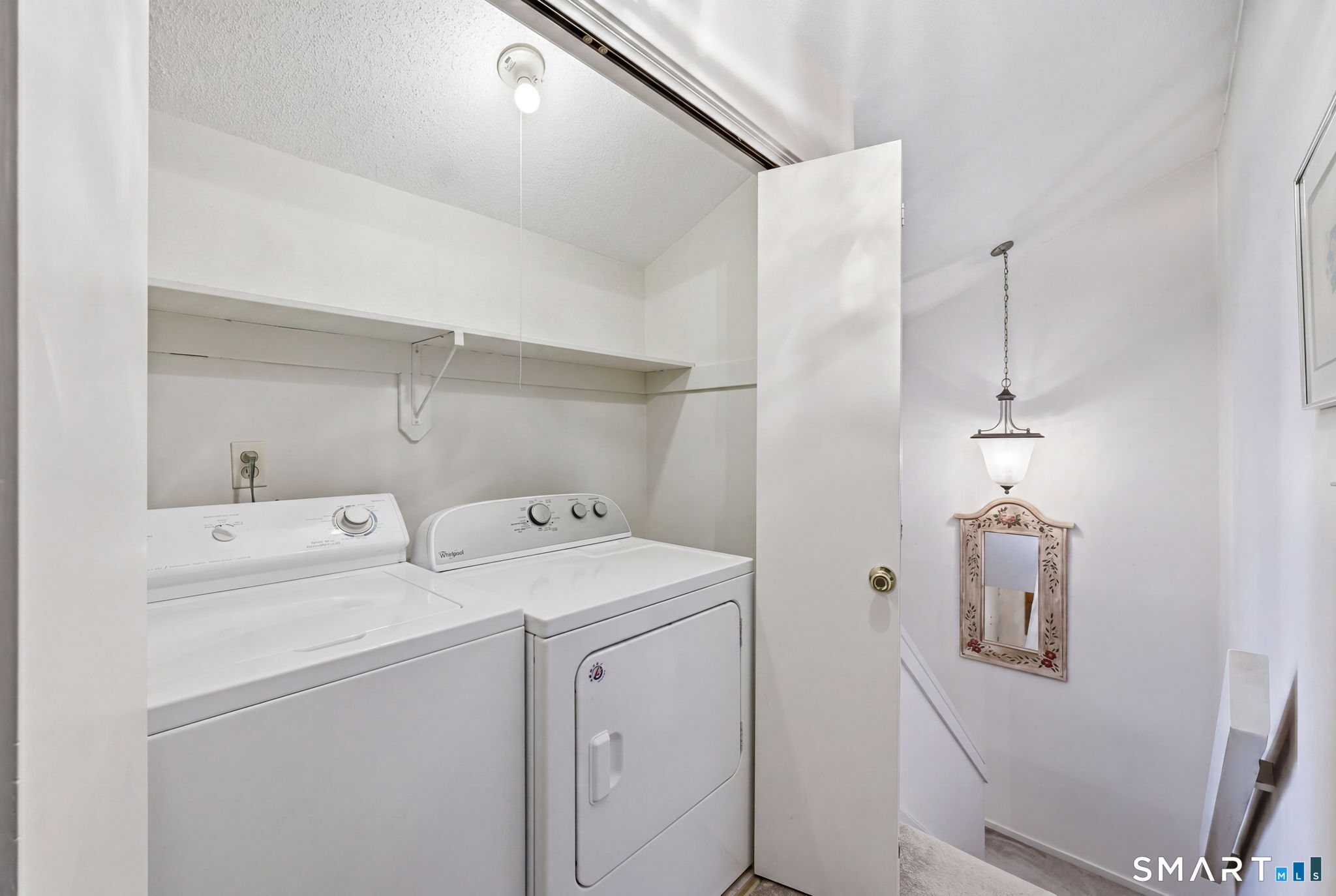 23 Maple Lane, Unit 23 Avon, CT 06001 - Photo 21 of 33 a utility room with dryer and washer