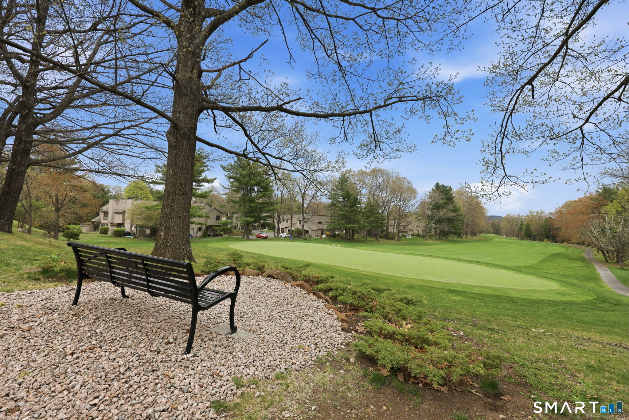 23 Maple Lane, Unit 23 Avon, CT 06001 - Photo 22 of 33 a view of a bench in a garden