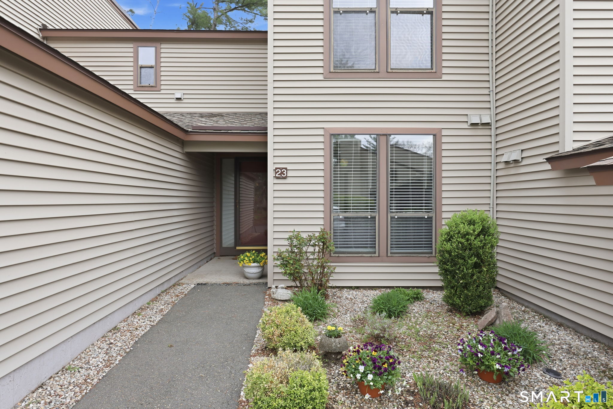 23 Maple Lane, Unit 23 Avon, CT 06001 - Photo 27 of 33 a house with a white door