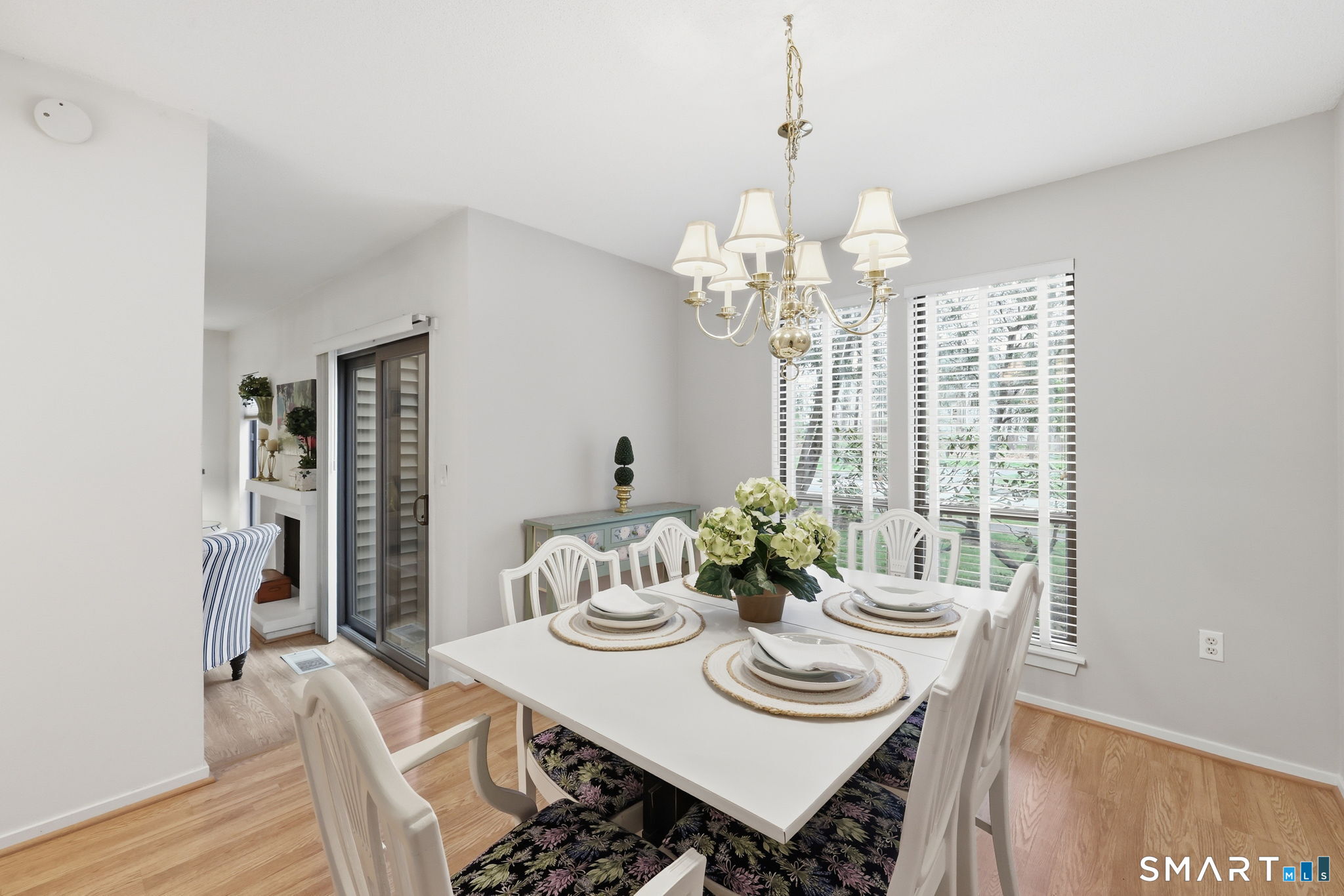 23 Maple Lane, Unit 23 Avon, CT 06001 - Photo 6 of 33 a view of a dining room with furniture window and wooden floor