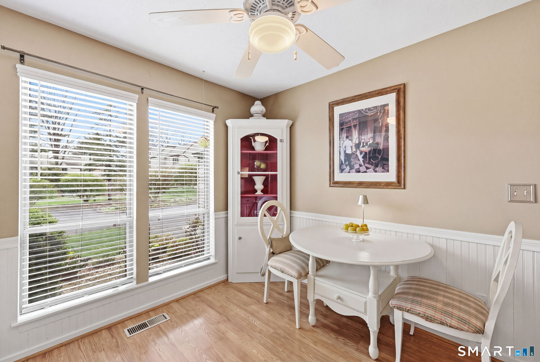 23 Maple Lane, Unit 23 Avon, CT 06001 - Photo 10 of 33 a view of a dining room with furniture and wooden floor