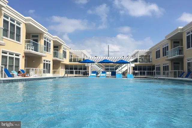 a front view of a building with street view