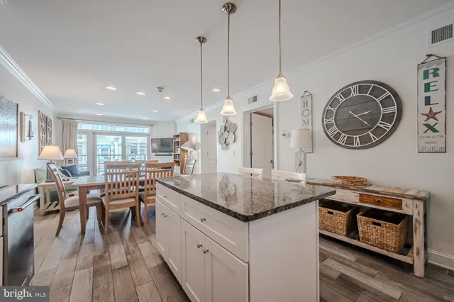 a kitchen with a table chairs and a stove