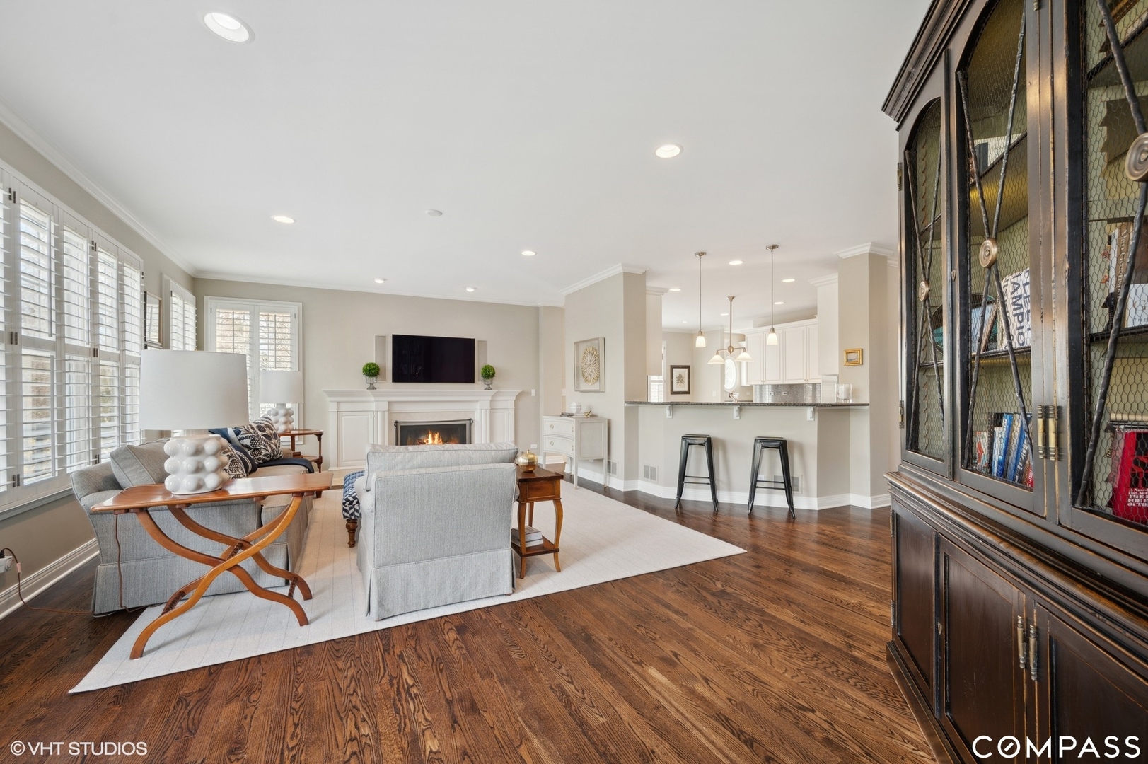 1437 Kittyhawk Lane Glenview, IL 60026 - Photo 16 of 39 a living room with furniture and a flat screen tv