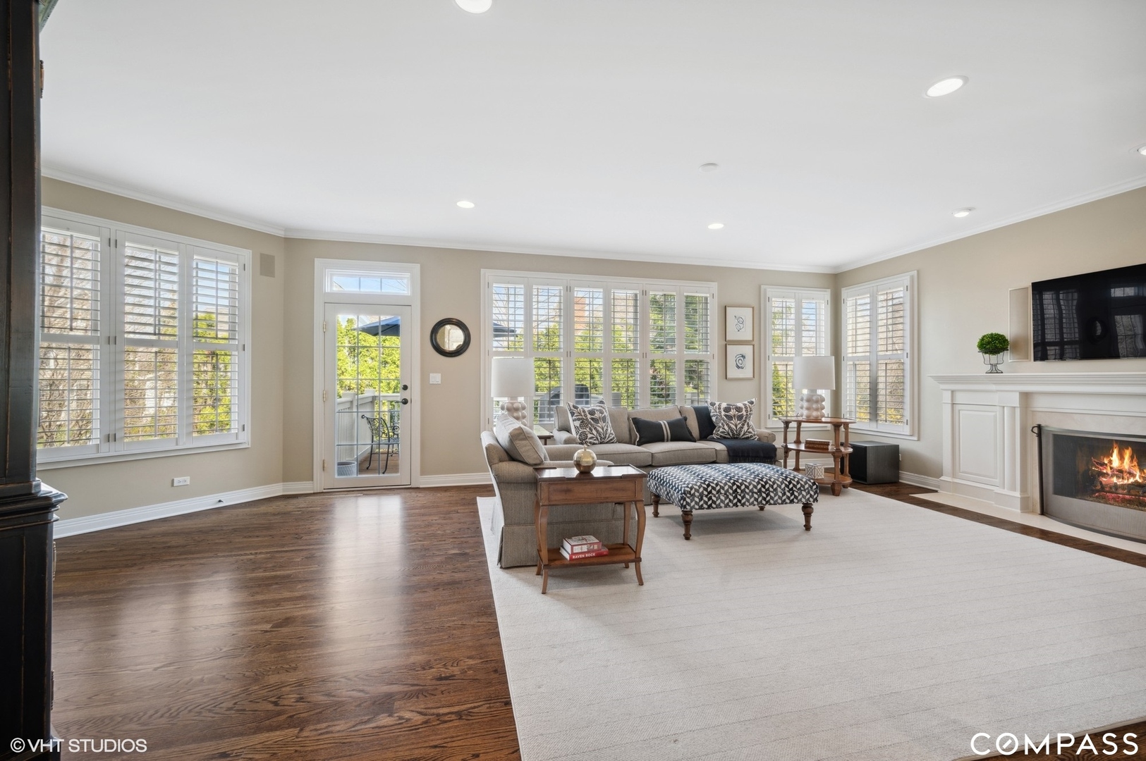 1437 Kittyhawk Lane Glenview, IL 60026 - Photo 17 of 39 a living room with furniture and a fireplace