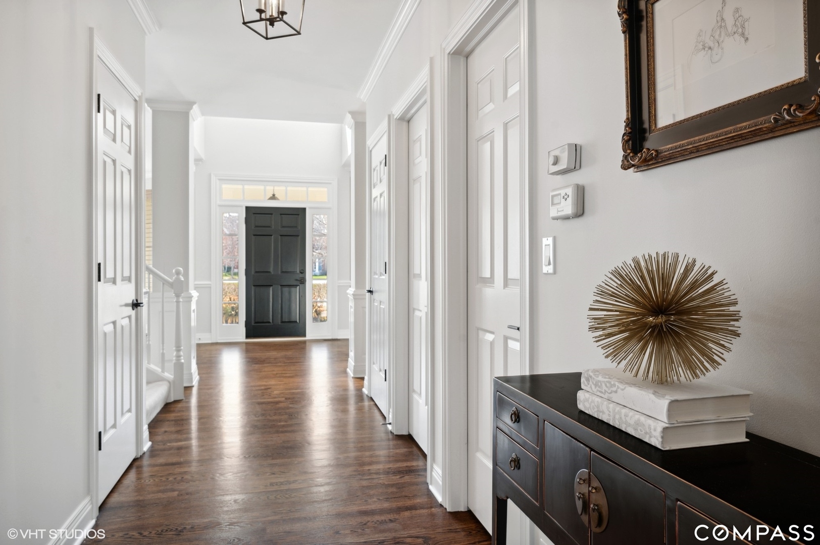 1437 Kittyhawk Lane Glenview, IL 60026 - Photo 19 of 39 a view of entryway and hall with wooden floor