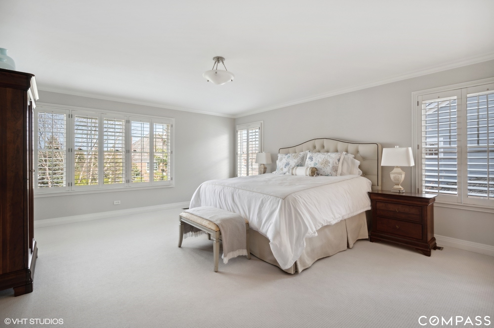 1437 Kittyhawk Lane Glenview, IL 60026 - Photo 20 of 39 a spacious bedroom with a bed and a large window