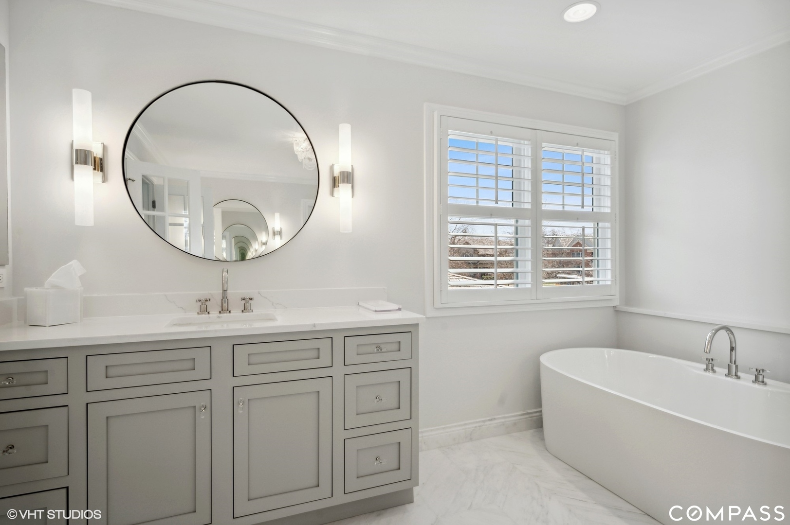 1437 Kittyhawk Lane Glenview, IL 60026 - Photo 23 of 39 a bathroom with a sink and a mirror