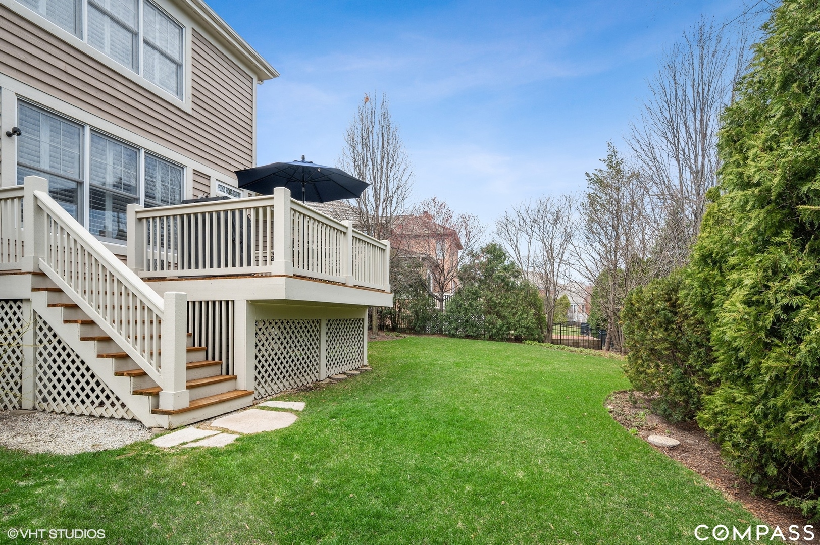1437 Kittyhawk Lane Glenview, IL 60026 - Photo 33 of 39 a view of a house with a yard and deck