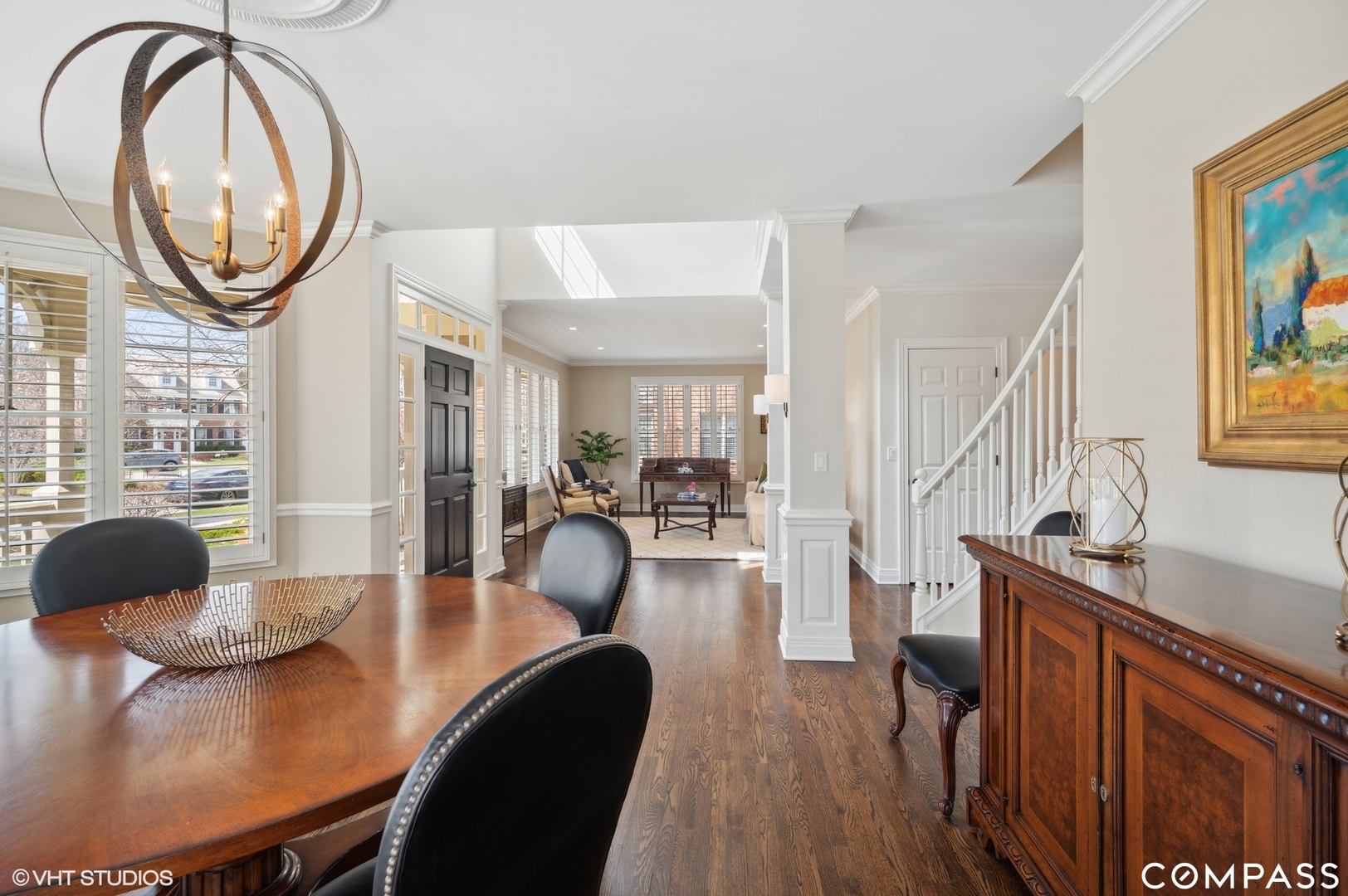 1437 Kittyhawk Lane Glenview, IL 60026 - Photo 10 of 39 a view of a dining room with furniture and a potted plant