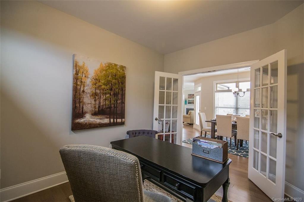3002 Portico Place, Unit 38 Tega Cay, SC 29708 - Photo 26 of 38 a dining room with furniture and window