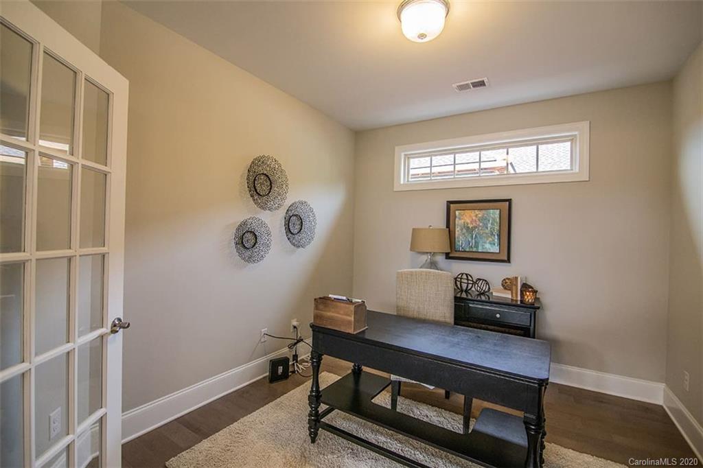 3002 Portico Place, Unit 38 Tega Cay, SC 29708 - Photo 28 of 38 a workspace with furniture and window