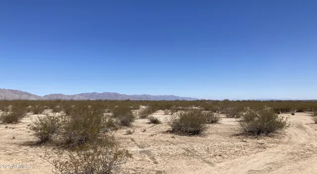 a view of lake with mountain