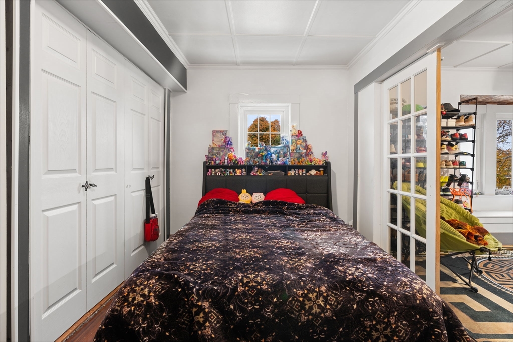 80 Ferry Street, Unit 80A Lawrence, MA 01841 - Photo 11 of 38 a view of a hallway with closet and toys