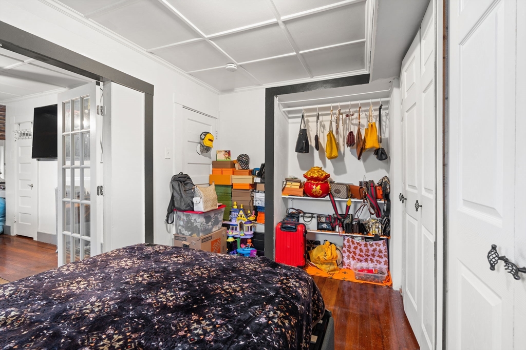 80 Ferry Street, Unit 80A Lawrence, MA 01841 - Photo 12 of 38 a bed room with a bed