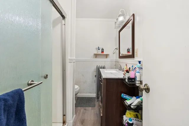 a bathroom with a sink and mirror