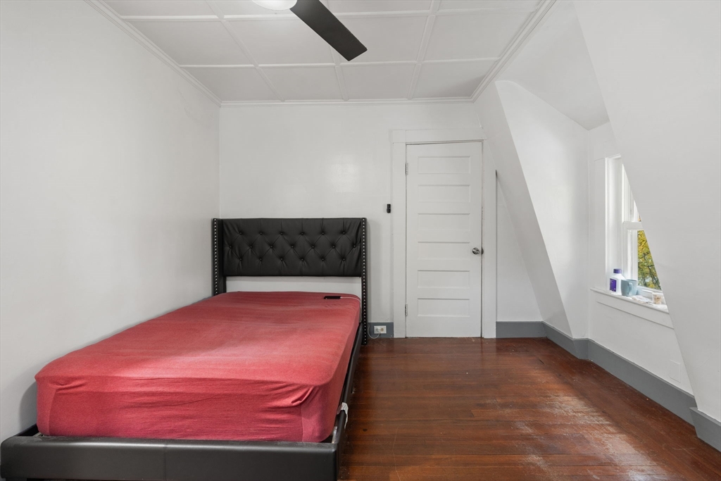 80 Ferry Street, Unit 80A Lawrence, MA 01841 - Photo 14 of 38 a room with a bed and a window