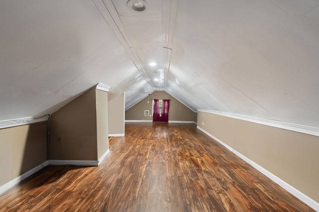 80 Ferry Street, Unit 80A Lawrence, MA 01841 - Photo 17 of 38 a view of a room with wooden floor and window