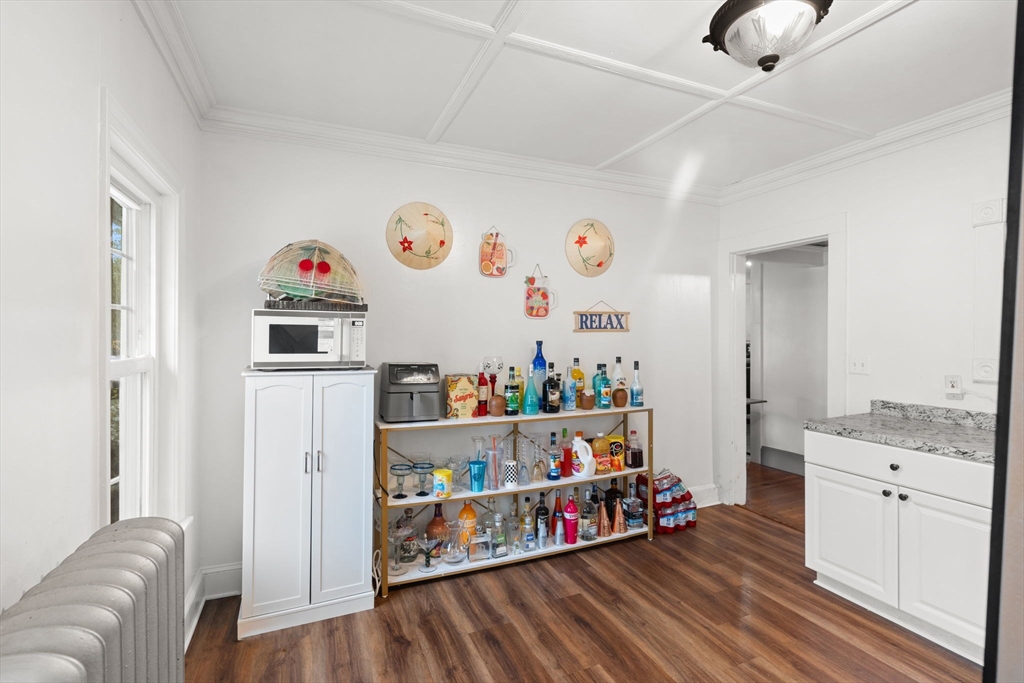 80 Ferry Street, Unit 80A Lawrence, MA 01841 - Photo 21 of 38 a living room with furniture and a window