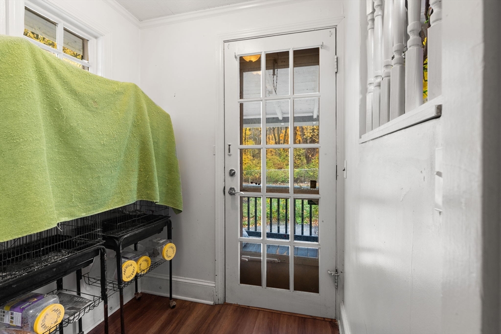 80 Ferry Street, Unit 80A Lawrence, MA 01841 - Photo 29 of 38 a view of staircase and utility room with wooden floor