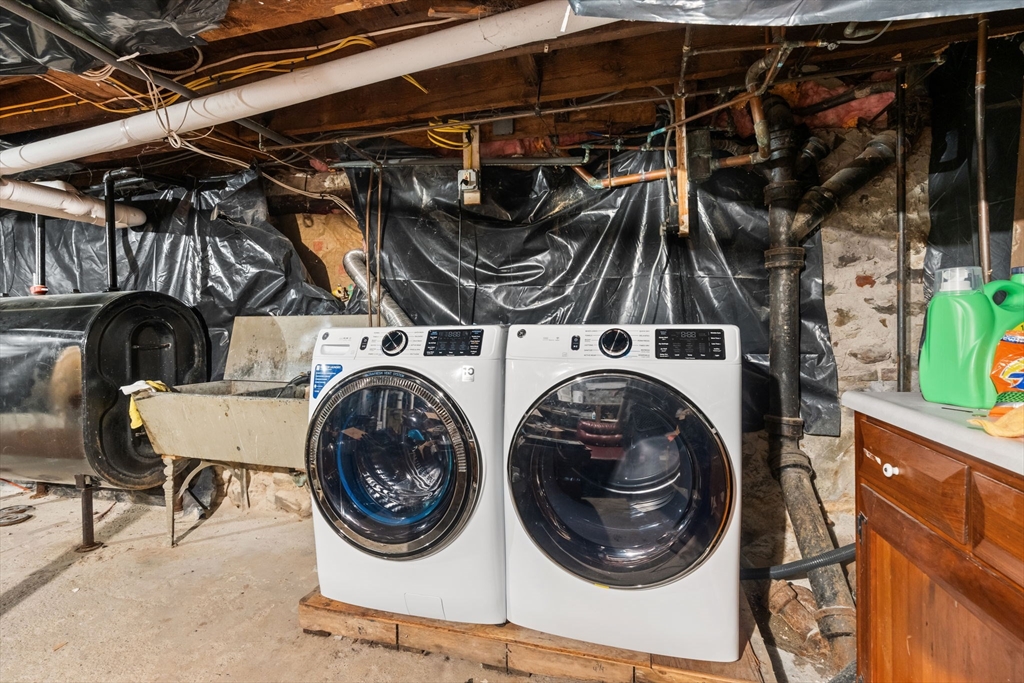 80 Ferry Street, Unit 80A Lawrence, MA 01841 - Photo 32 of 38 a utility room with dryer and washer