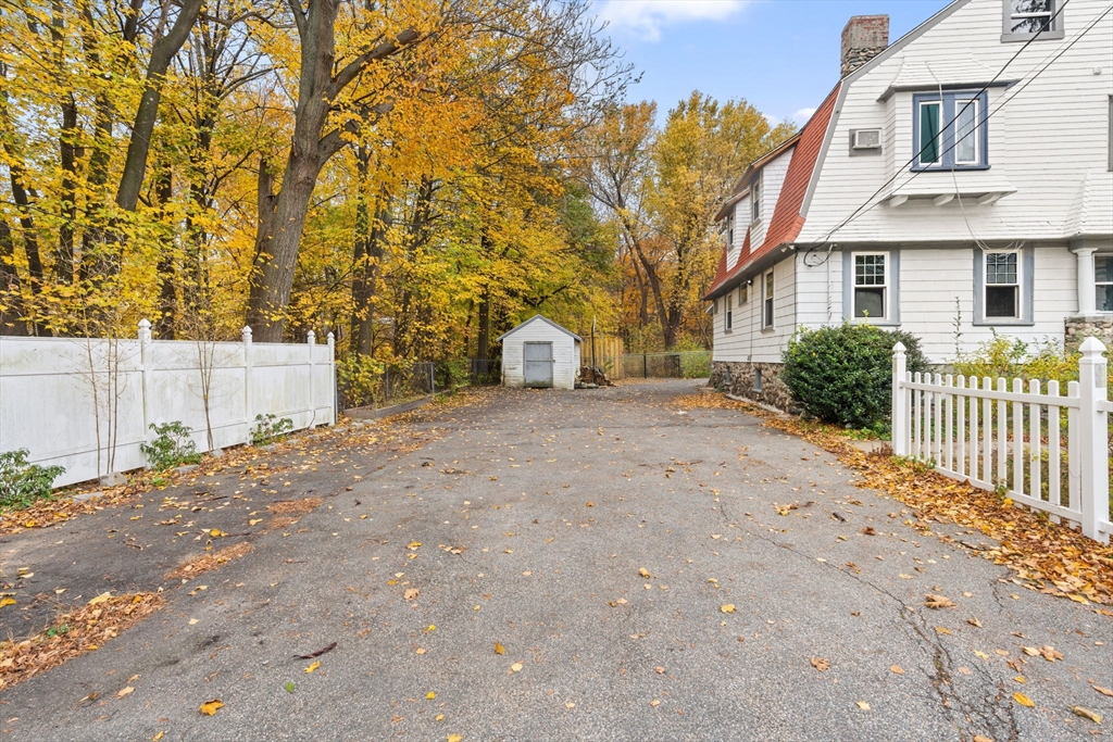 80 Ferry Street, Unit 80A Lawrence, MA 01841 - Photo 4 of 38 a view of a house with a yard