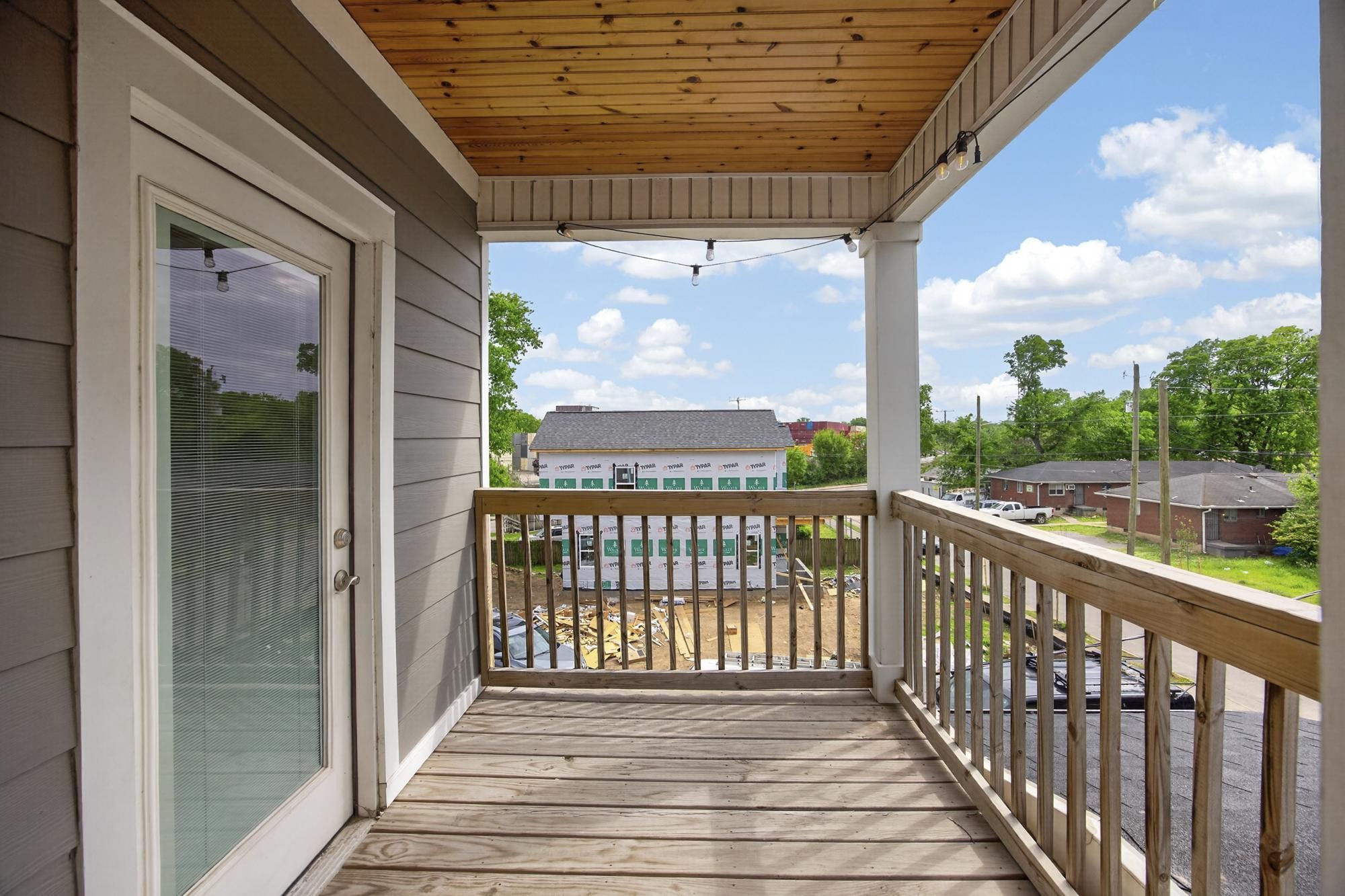7 Decatur Street Nashville, TN 37210 - Photo 38 of 43 a view of a balcony with wooden floor