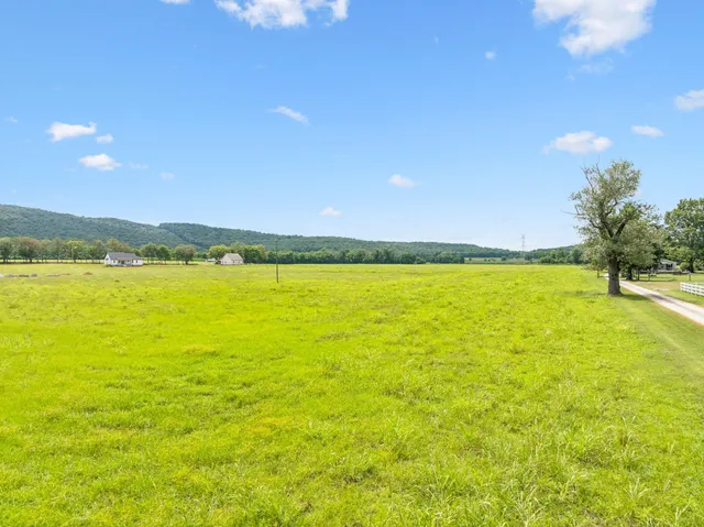 a view of an ocean and a mountain