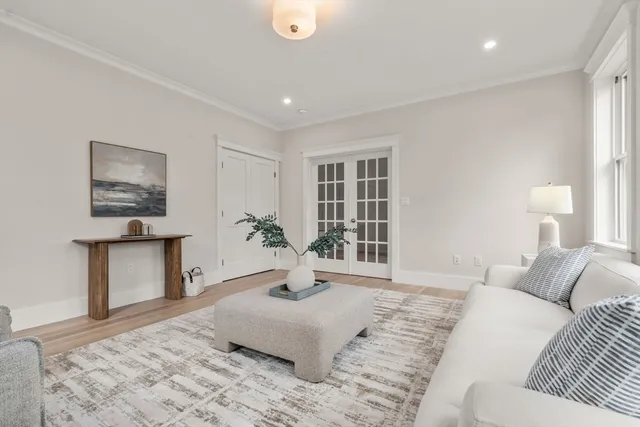 a bedroom with a large bed and a couch