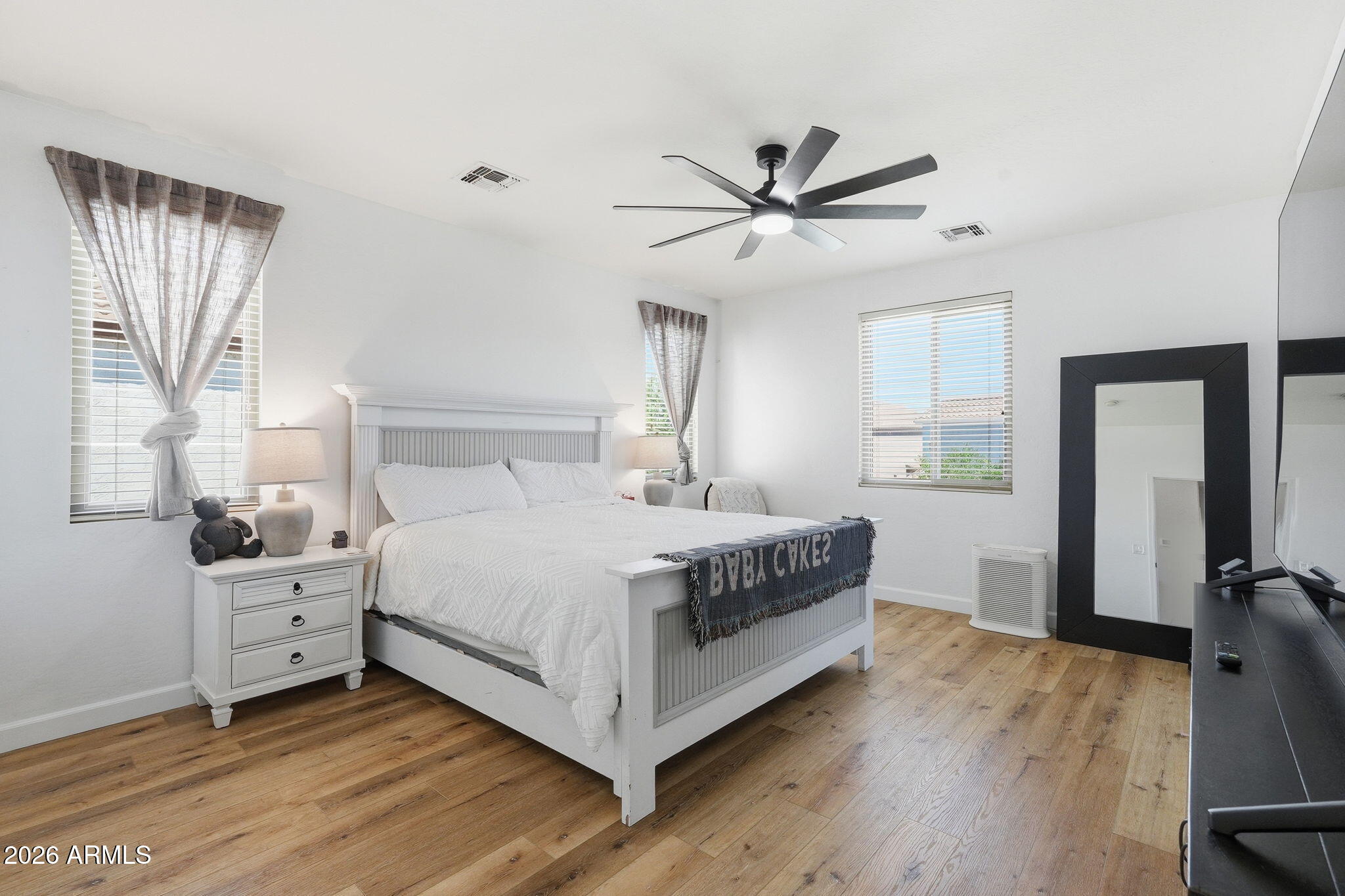 4184 East Trigger Way Gilbert, AZ 85297 - Photo 5 of 51 a bedroom with a bed and window