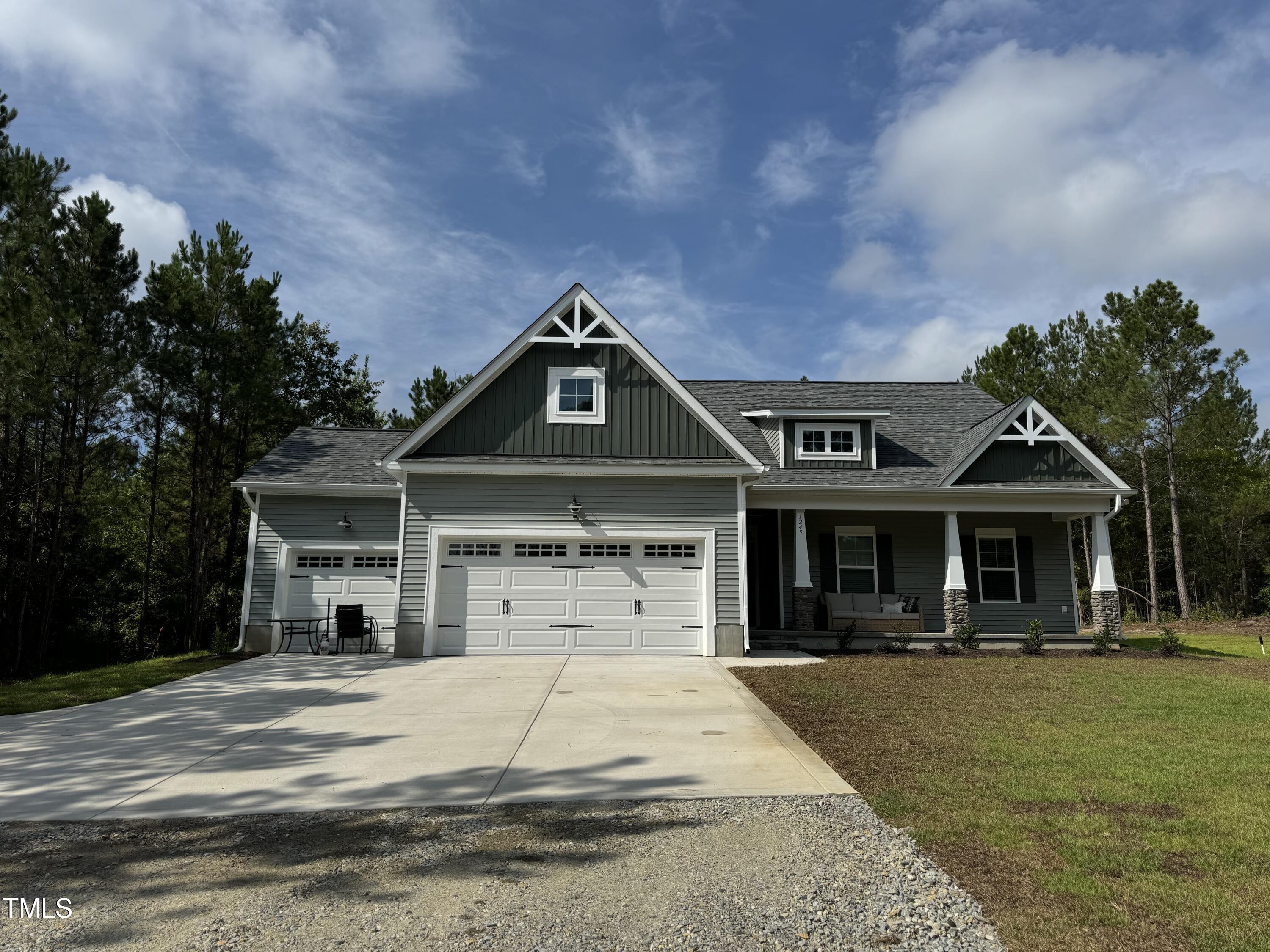 1245 Ring Road Carthage, NC 28327 - Photo 6 of 6 a front view of a house with a yard